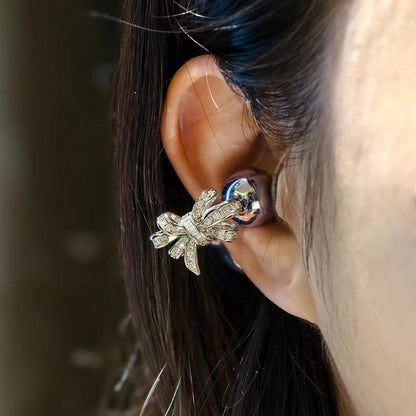 Bow Rhinestone تزيين سماعات Clip-On – Silver Bow Style D ديزاين فاخر make it long
